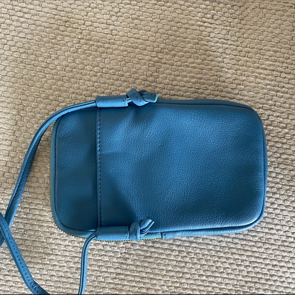 HOBO purse. New with tags. 100% genuine leather. Color: Dusty blue